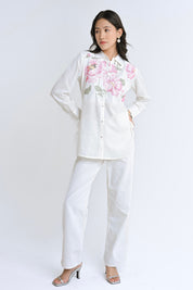 indigrey white Ambrosia shirt featuring intricate pink pixel cross stitch floral embroidery on a button-down top