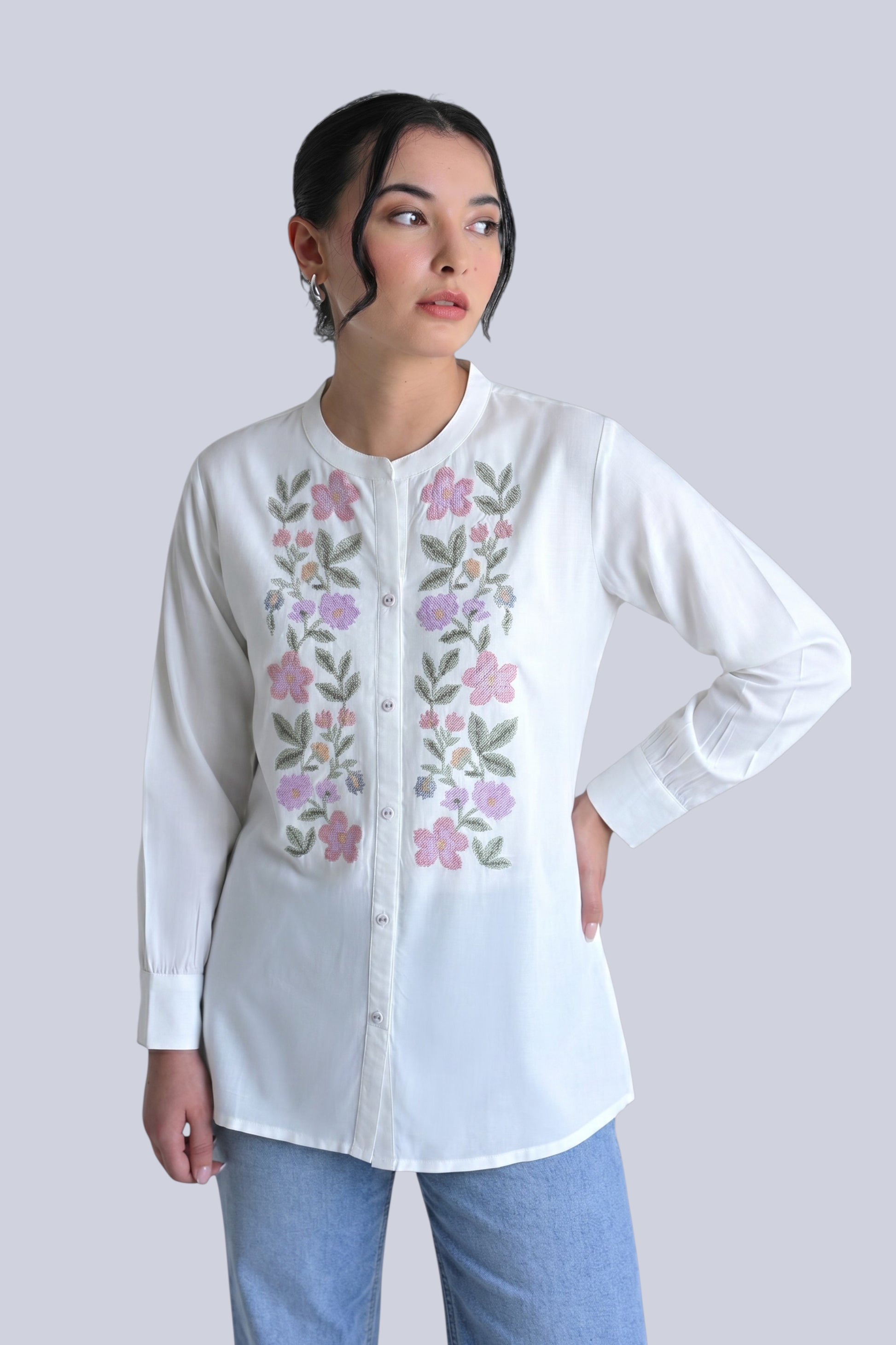 indigrey Aurora white shirt featuring handcrafted pink and green cross stitch floral embroidery and a mandarin collar