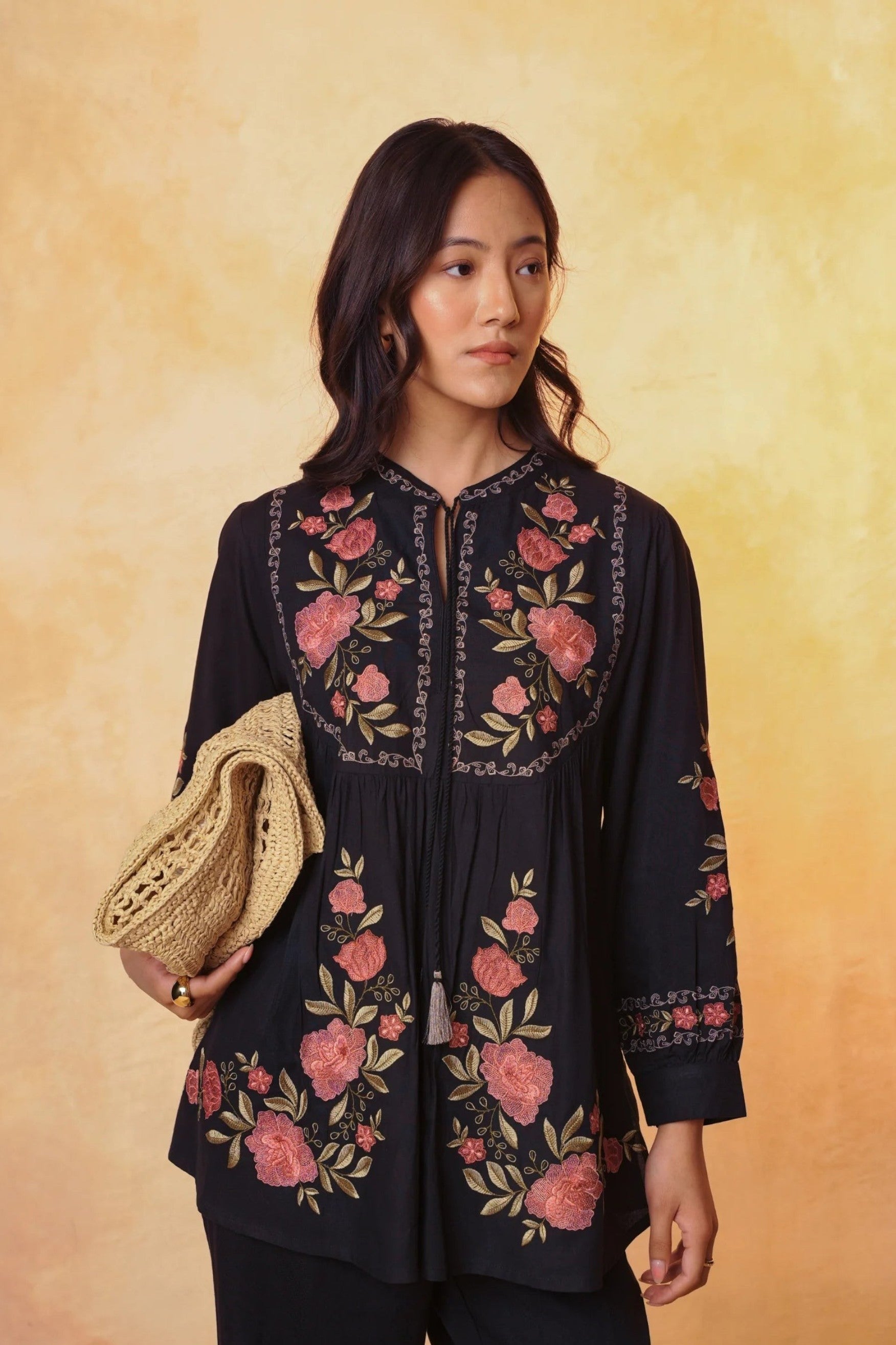 indigrey Goa black top with vibrant Tatami gradient floral embroidery, gathered fabric, and voluminous sleeves