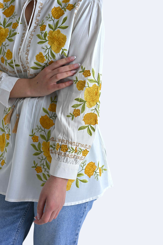 indigrey white Goa top featuring yellow floral tatami gradient embroidery on the yoke and sleeves with tie-neck