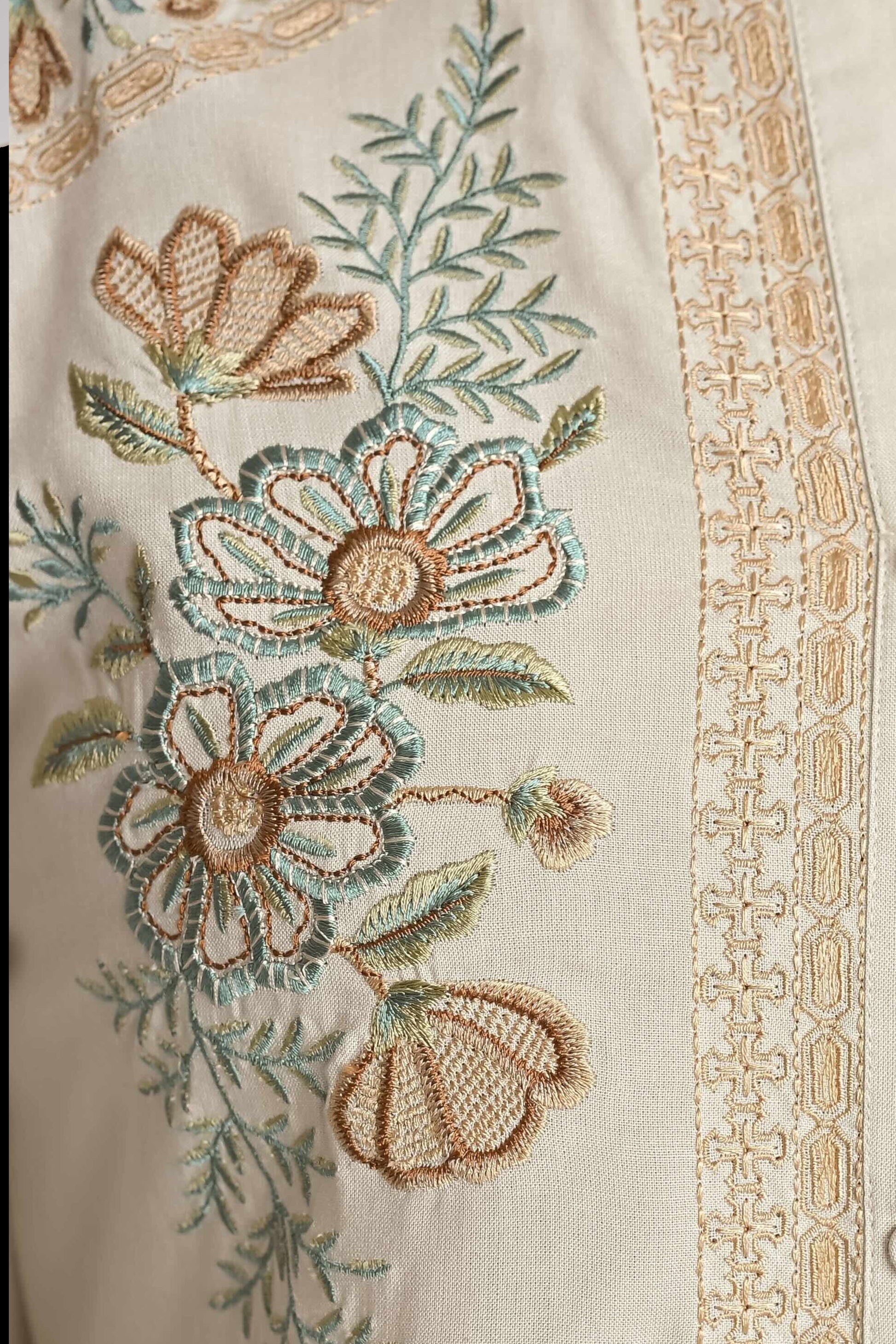 indigrey ivory shirt featuring intricate floral chain tatami embroidery in earthy tones on the yoke and front placket
