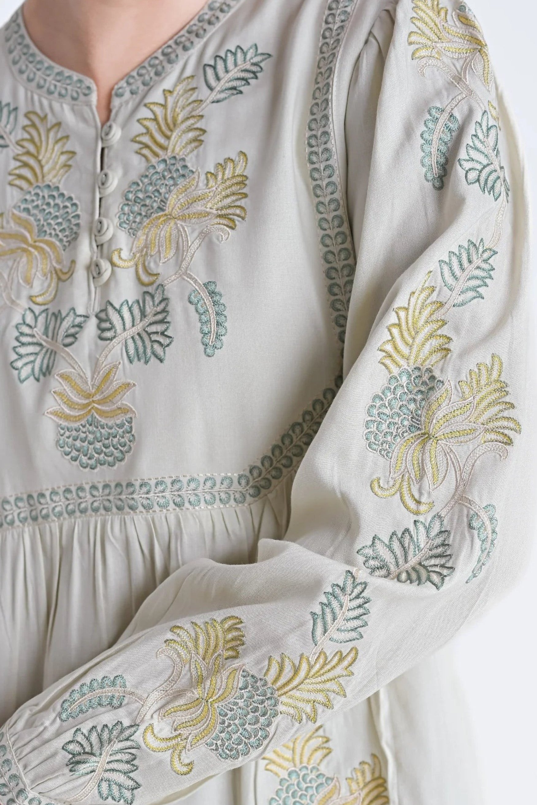 indigrey ivory Dahlia top featuring intricate muted tonal pebblework embroidery on the yoke and sleeves