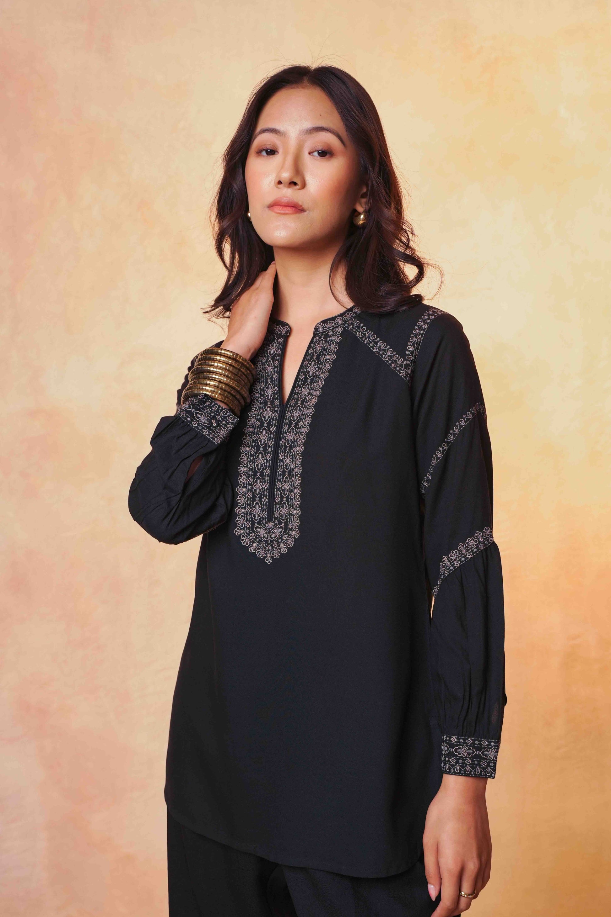 indigrey June black top featuring intricate tonal filigree traceline floral embroidery on a soft fabric