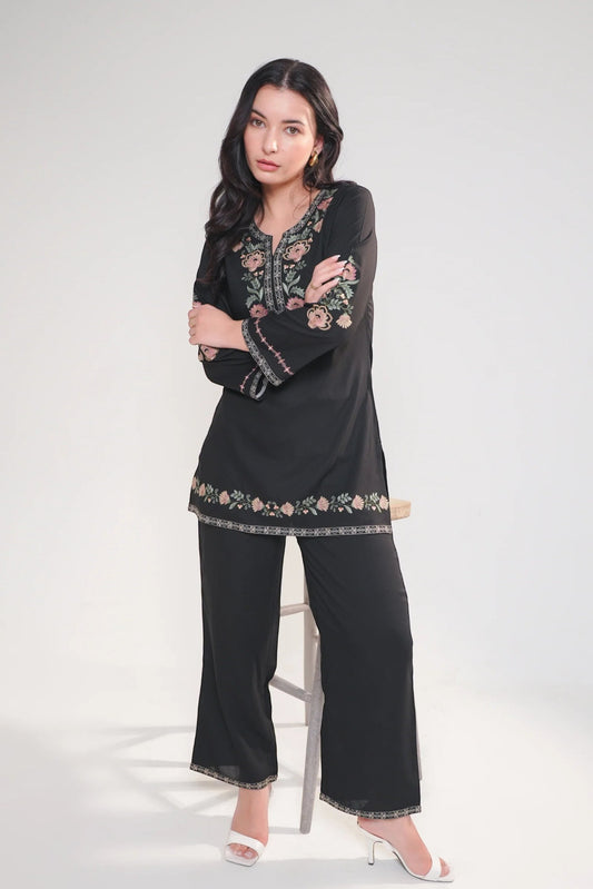 indigrey Kaia black co-ord set featuring Kashmiri-inspired floral stem threadfill embroidery on a tunic and trousers.