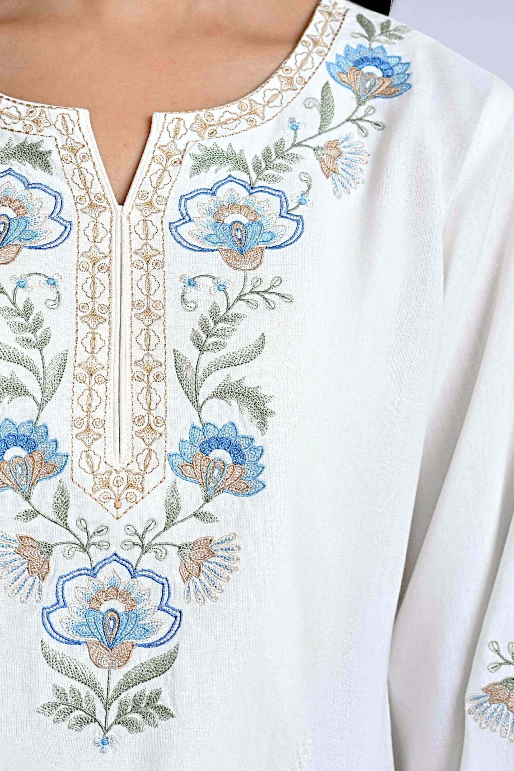 indigrey white Kaia co-ord set featuring delicate blue and gold Kashmiri-inspired stem threadfill embroidery.