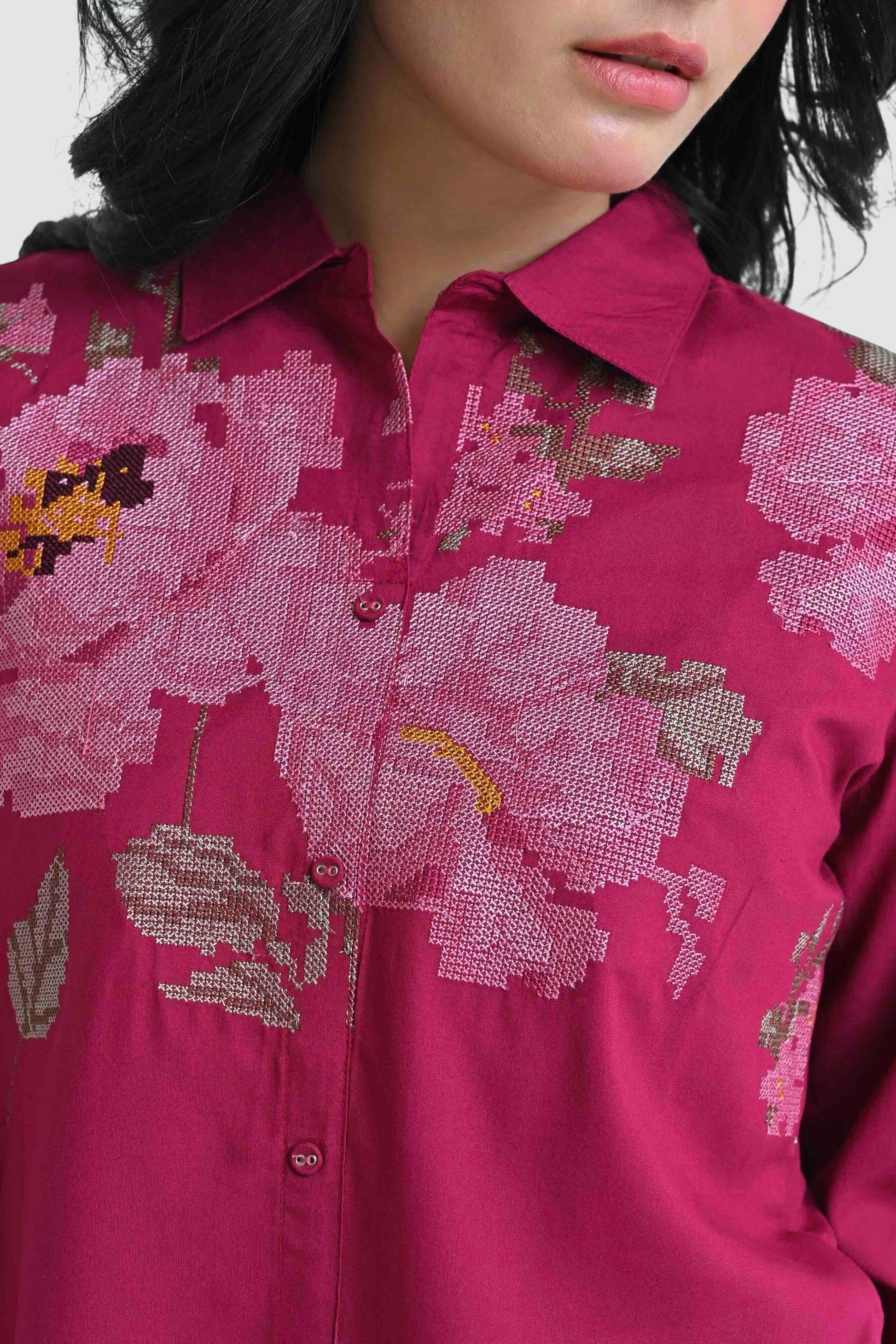 indigrey magenta button down shirt featuring intricate floral cross-stitch embroidery on the chest