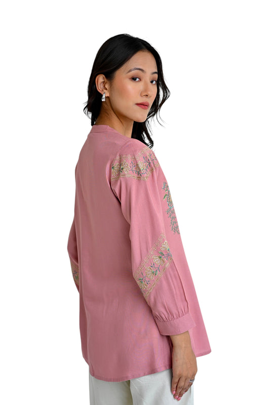 indigrey peach shirt with earthy chain tatami embroidery worn by a woman, side profile view