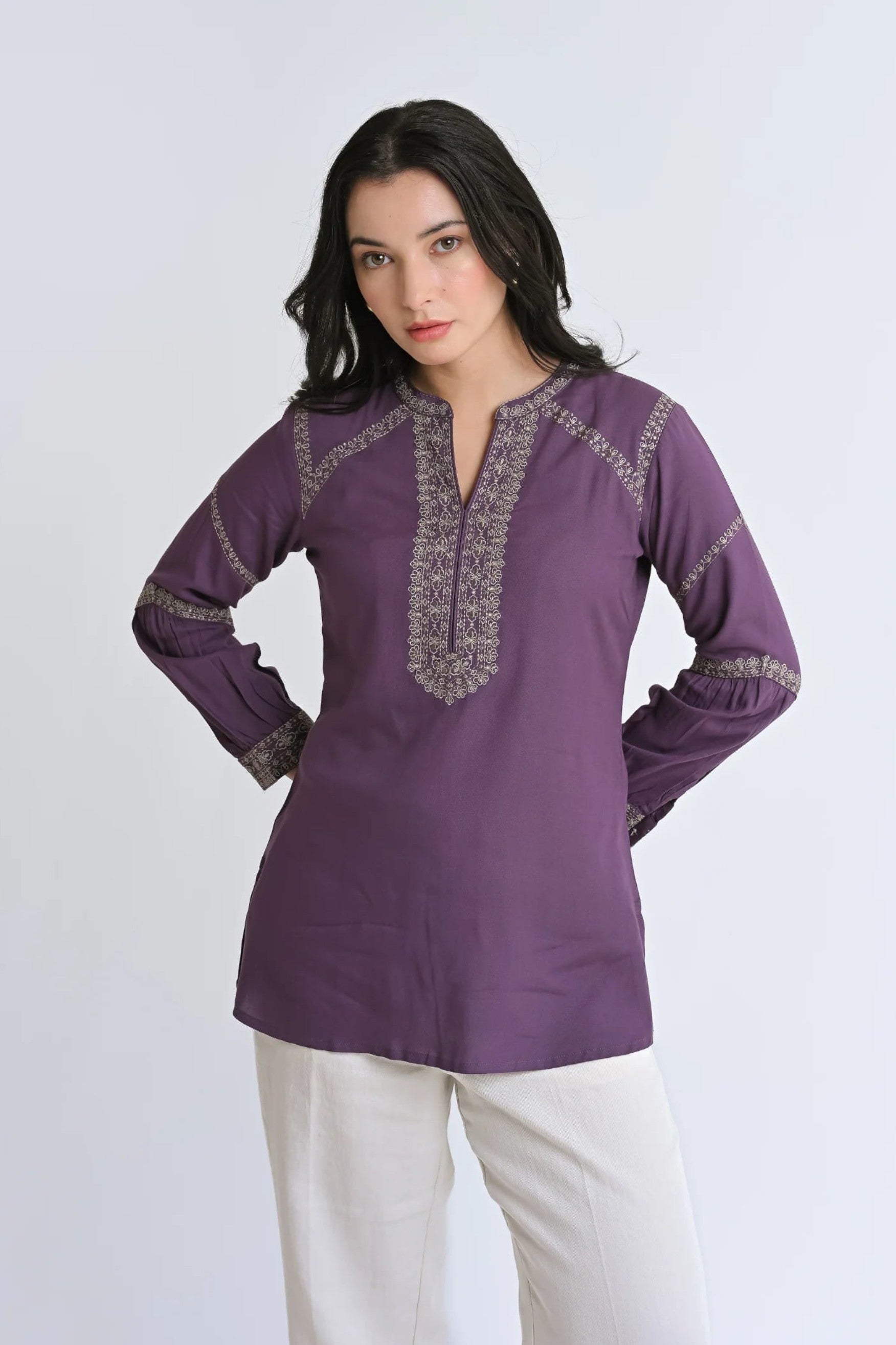 indigrey June purple top featuring intricate tonal filigree traceline embroidery and long sleeves on a model