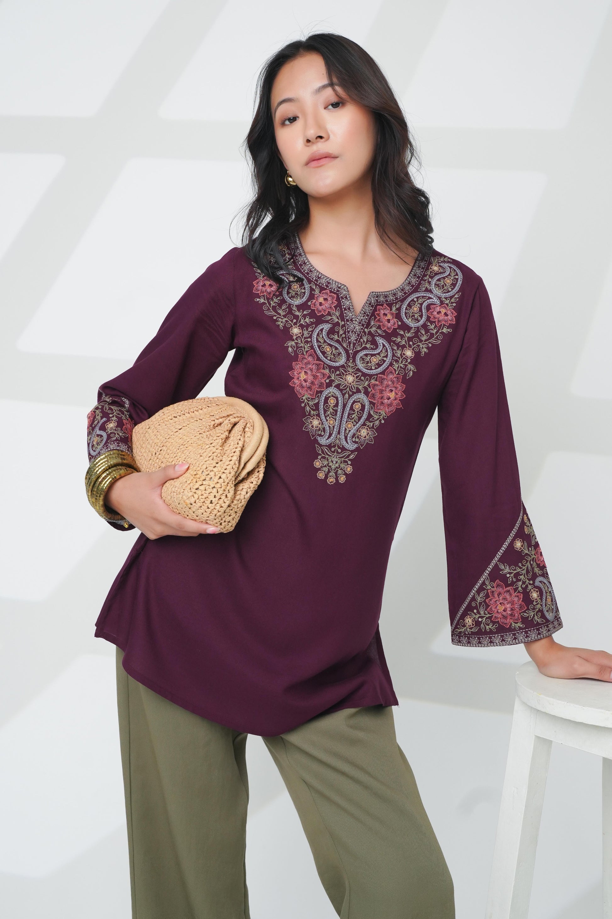 indigrey Ambi wine embroidered top with floral paisley motifs, full sleeves, and a relaxed fit on a model.